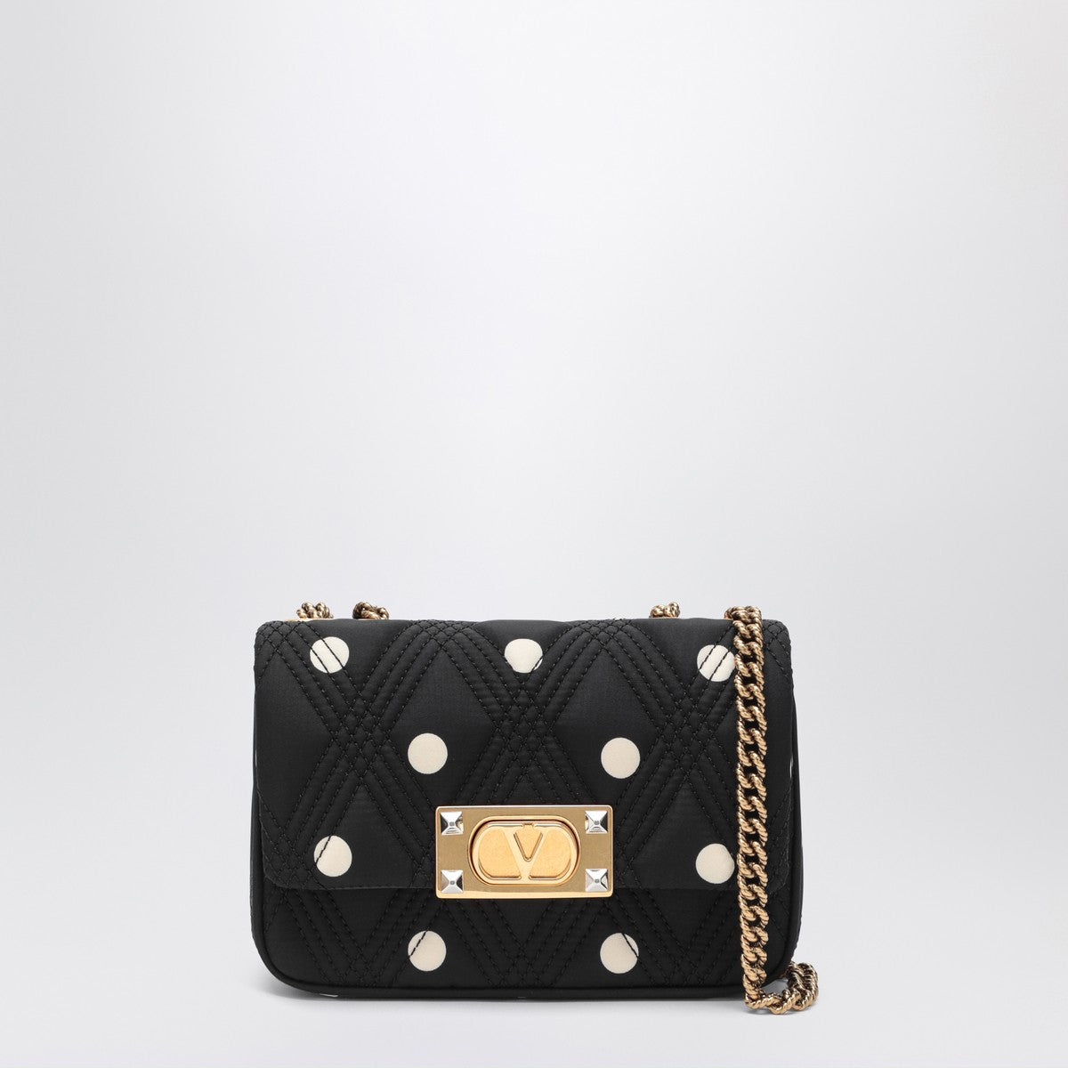 Valentino Garavani Black Quiltie 67 bag with ivory polka dots