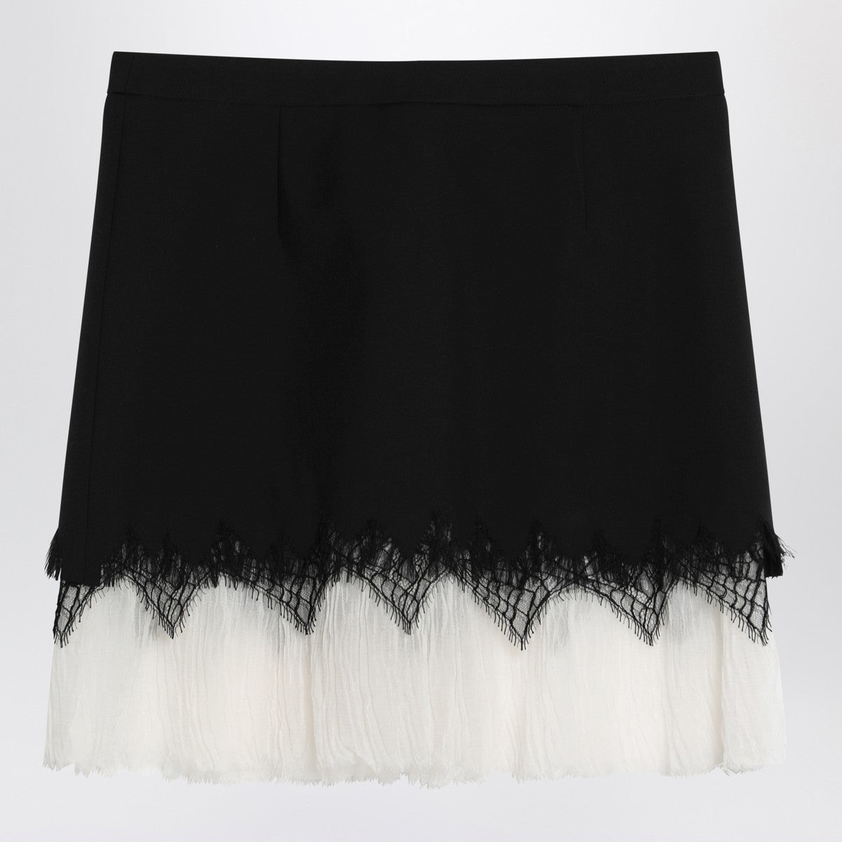 Alexander McQueen Mini skirt with black/ivory spider lace